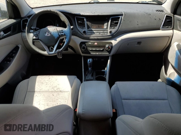 2017 Hyundai Tucson SE with VIN KM8J33A41HU506970, listed as a Copart auction lot 52351705 with 86,074 mi miles and Salvage Title. Bid and sale history available at DreamBid. Image 8.