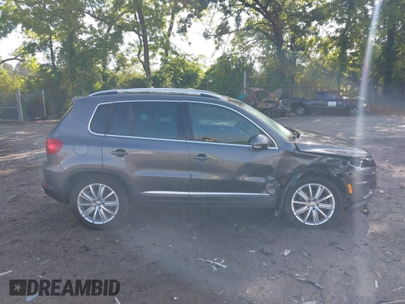 2013 Volkswagen Tiguan S with VIN WVGAV3AX7DW624136, listed as a IAAI auction lot 42256657 with 124,000 mi miles and . Bid and sale history available at DreamBid. Image 13.