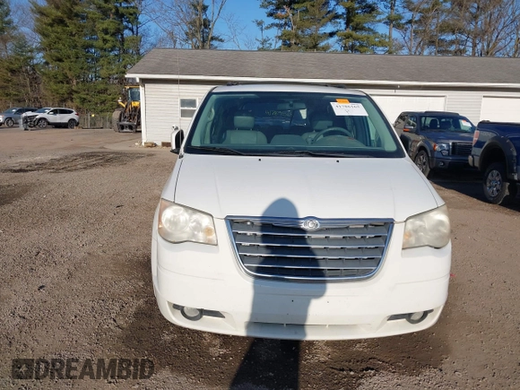 2009 Chrysler Town & Country Touring with VIN 2A8HR54179R631851, listed as a IAAI auction lot 41786165 with 126,988 mi miles and . Bid and sale history available at DreamBid. Image 13.