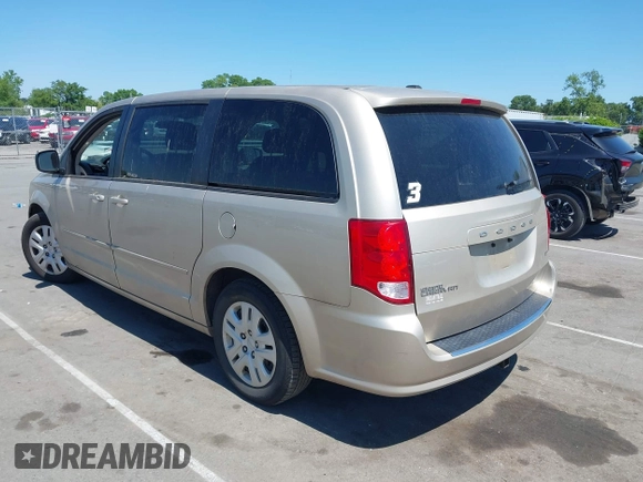 2015 Dodge Grand Caravan American Value with VIN 2C4RDGBG3FR647957, listed as a IAAI auction lot 42147813 with 129,859 mi miles and . Bid and sale history available at DreamBid. Image 3.