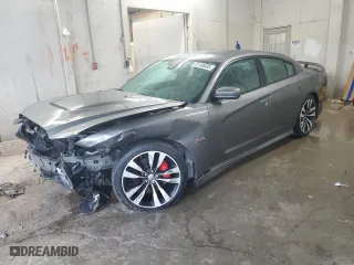 2012 Dodge Charger SRT8 with VIN 2C3CDXEJ3CH185659, listed as a Copart auction lot 51146005 with 136,823 mi miles and Salvage Title. Bid and sale history available at carsss.com. Image 1.