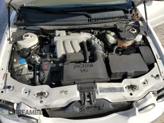 2007 Jaguar X-Type z VIN SAJWA51A67WJ24665, wystawiony jako Copart lot #86817544 z przebiegiem 52 027 mil mil oraz Szkoda całkowita • Salvage title. Historia ofert i sprzedaży dostępna na DreamBid. Obrazek 11.