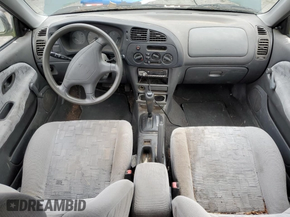 1998 Mitsubishi Mirage DE z VIN JA3AY26A2WU042095, wystawiony jako Copart lot #84700394 z przebiegiem 124 362 mil mil oraz Czysty tytuł • Clean title. Historia ofert i sprzedaży dostępna na DreamBid. Obrazek 8.
