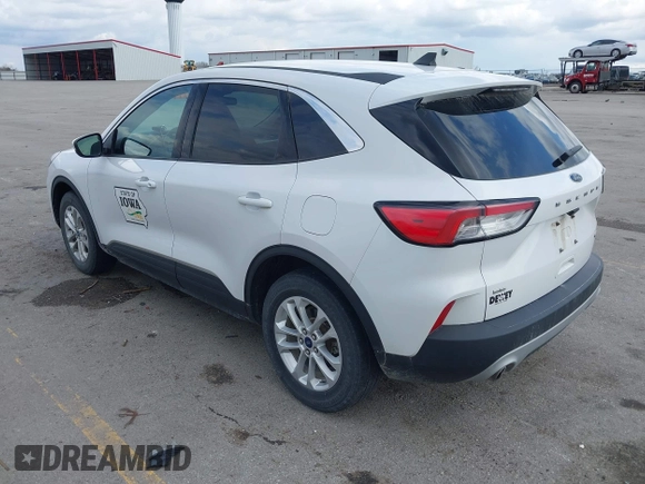 2020 Ford Escape SE with VIN 1FMCU9G67LUC31633, listed as a IAAI auction lot 42173290 with 136,937 mi miles and . Bid and sale history available at DreamBid. Image 3.
