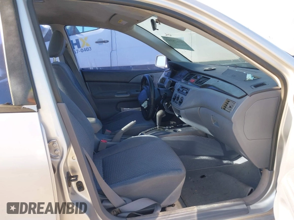 2002 Mitsubishi Lancer LS with VIN JA3AJ36E22U035784, listed as a IAAI auction lot 40628995 with 1 mi miles. Bid and sale history available at carsss.com. Image 5.