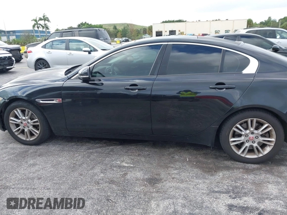 2017 Jaguar XE 25t Premium with VIN SAJAD4BG4HA956227, listed as a IAAI auction lot 40573821 with 152,395 mi miles. Bid and sale history available at carsss.com. Image 14.