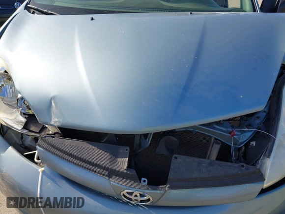 2009 Toyota Sienna CE with VIN 5TDZK23C19S268830, listed as a IAAI auction lot 42032259 with 113,596 mi miles. Bid and sale history available at carsss.com. Image 10.
