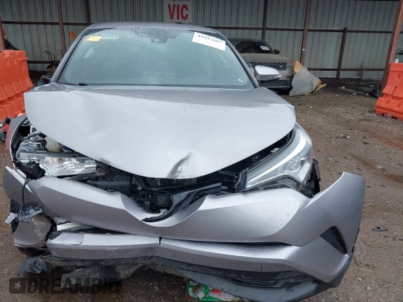 2018 Toyota C-HR XLE z VIN NMTKHMBX8JR034946, wystawiony jako IAAI lot #41947667 z przebiegiem 84 196 mil mil oraz . Historia ofert i sprzedaży dostępna na DreamBid. Obrazek 13.