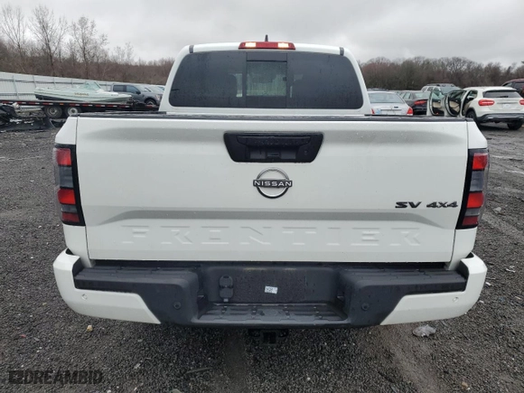 2023 Nissan Frontier PRO-4X with VIN 1N6ED1EK6PN657177, listed as a Copart auction lot 52156285 with 27,115 mi miles and Salvage Title. Bid and sale history available at carsss.com. Image 6.