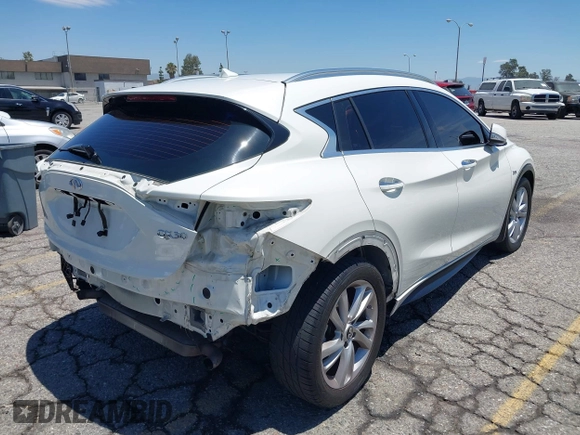 2018 Infiniti QX30 Premium z VIN SJKCH5CP5JA006199, wystawiony jako IAAI lot #42673215 z przebiegiem 107 294 mil mil oraz . Historia ofert i sprzedaży dostępna na DreamBid. Obrazek 4.