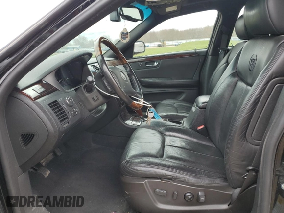 2007 Cadillac DTS Performance with VIN 1G6KD57937U201301, listed as a Copart auction lot 52868565 with 119,972 mi miles and Salvage Title. Bid and sale history available at carsss.com. Image 7.