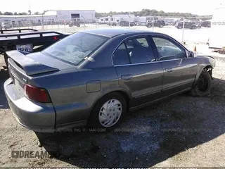 2003 Mitsubishi Galant ES z VIN 4A3AA46G53E217951, wystawiony jako IAAI lot #24872153 z przebiegiem 155 114 mil mil oraz . Historia ofert i sprzedaży dostępna na DreamBid. Obrazek 4.