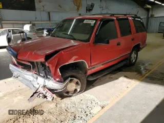 1999 GMC Yukon with VIN 1GKEK13R0XJ768859, listed as a Copart auction lot 84005304 with 190,960 mi miles and Salvage Title. Bid and sale history available at carsss.com. Image 1.