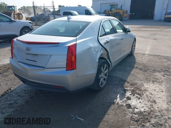 2015 Cadillac ATS Luxury RWD z VIN 1G6AB5RA6F0127029, wystawiony jako IAAI lot #42376359 z przebiegiem 131 823 mil mil oraz . Historia ofert i sprzedaży dostępna na DreamBid. Obrazek 4.