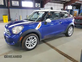 2015 MINI Paceman z VIN WMWSS1C57FWN46734, wystawiony jako Copart lot #52543745 z przebiegiem 107 758 mil mil oraz Czysty tytuł • Clean title. Historia ofert i sprzedaży dostępna na DreamBid. Obrazek 1.