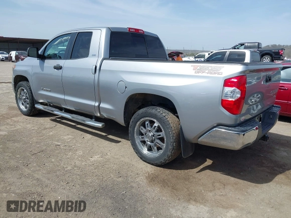 2018 Toyota Tundra 2WD SR with VIN 5TFRM5F16JX133735, listed as a IAAI auction lot 41818455 with 148,456 mi miles. Bid and sale history available at carsss.com. Image 3.