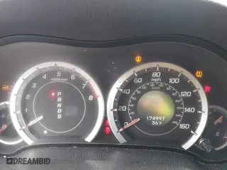 2009 Acura TSX with VIN JH4CU26669C019140, listed as a IAAI auction lot 41633824 with 174,997 mi miles. Bid and sale history available at carsss.com. Image 7.