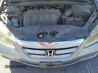 2005 Honda Odyssey Touring z VIN 5FNRL38805B131416, wystawiony jako Copart lot #59157395 z przebiegiem 263 087 mil mil oraz Szkoda całkowita • Salvage title. Historia ofert i sprzedaży dostępna na DreamBid. Obrazek 12.