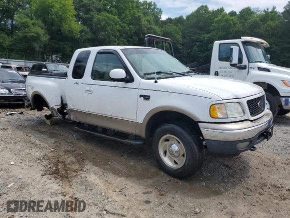 2001 Ford F-150 XL with VIN 1FTRX08L51KE49004, listed as a Copart auction lot 60470745 with 199,490 mi miles and Salvage title. Bid and sale history available at DreamBid. Image 4.
