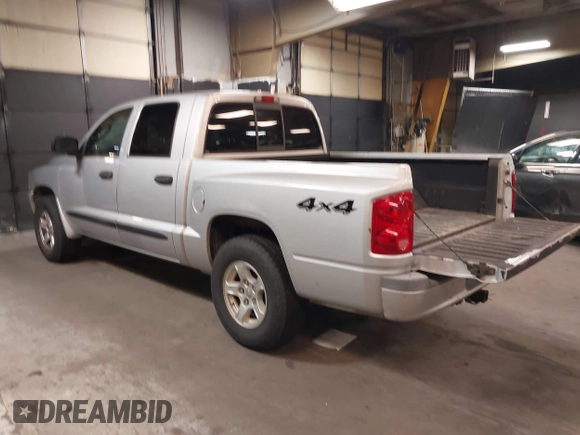 2005 Dodge Dakota SLT with VIN 1D7HW48N15S164352, listed as a IAAI auction lot 42190403 with 150,794 mi miles. Bid and sale history available at carsss.com. Image 3.