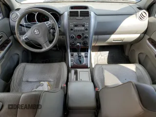 2008 Suzuki Grand Vitara Luxury z VIN JS3TD947784101653, wystawiony jako Copart lot #55773325 z przebiegiem 156 227 mil mil oraz Szkody całkowita. Historia ofert i sprzedaży dostępna na DreamBid. Obrazek 8.