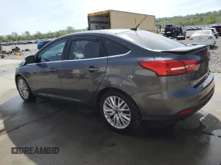 2015 Ford Focus Titanium с VIN 1FADP3J2XFL200668, выставлен на аукционе Copart как лот 54010865 с пробегом 138 459 миль миль и Списание • Salvage title. История ставок и продаж доступна на DreamBid. Изображение 2.