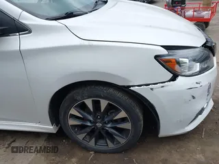 2017 Nissan Sentra SR z VIN 3N1AB7AP6HY400863, wystawiony jako IAAI lot #42268449 z przebiegiem 60 331 mil mil oraz . Historia ofert i sprzedaży dostępna na DreamBid. Obrazek 13.