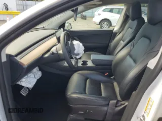 2022 Tesla Model Y Performance с VIN 7SAYGDEF2NF405596, выставлен на аукционе Copart как лот 52868195 с пробегом Не указан миль и Списание • Salvage title. История ставок и продаж доступна на DreamBid. Изображение 7.