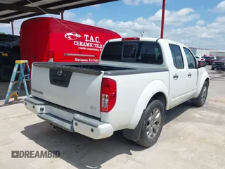 2021 Nissan Frontier SV z VIN 1N6ED0EA7MN705315, wystawiony jako IAAI lot #42080403 z przebiegiem 44 031 mil mil oraz . Historia ofert i sprzedaży dostępna na DreamBid. Obrazek 4.