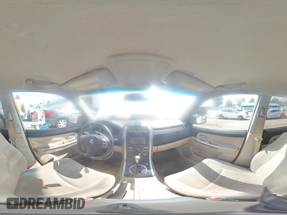 2013 Suzuki Grand Vitara Premium z VIN JS3TE0D62D4100310, wystawiony jako Copart lot #54916065 z przebiegiem 116 428 mil mil oraz Szkoda całkowita • Salvage title. Historia ofert i sprzedaży dostępna na DreamBid. Obrazek 15.