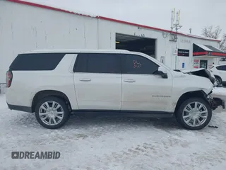 2022 Chevrolet Suburban High Country with VIN 1GNSKGKLXNR151036, listed as a IAAI auction lot 41549439 with 97,613 mi miles and . Bid and sale history available at DreamBid. Image 14.