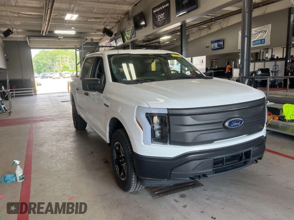 2022 Ford F-150 Lightning Pro with VIN 1FTVW1EL5NWG11725, listed as a IAAI auction lot 42832825 with 5,044 mi miles and . Bid and sale history available at DreamBid. Image 22.