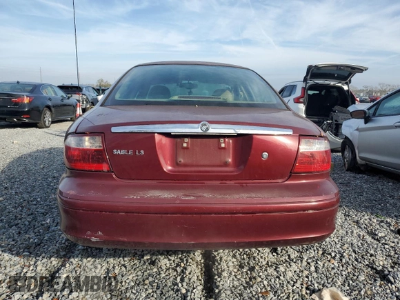 2005 Mercury Sable LS with VIN 1MEFM55S65A621703, listed as a Copart auction lot 42694955 with 176,644 mi miles and Salvage Title. Bid and sale history available at DreamBid. Image 6.