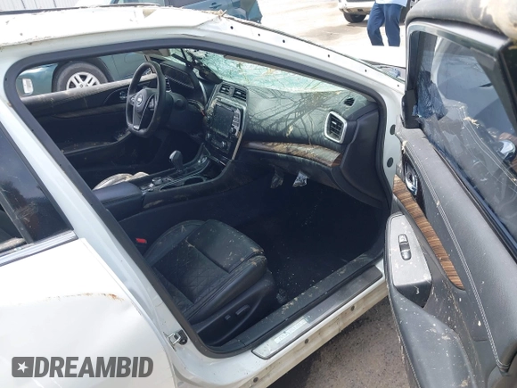 2016 Nissan Maxima SV z VIN 1N4AA6AP2GC437206, wystawiony jako IAAI lot #42082780 z przebiegiem Nie podano mil oraz . Historia ofert i sprzedaży dostępna na DreamBid. Obrazek 5.