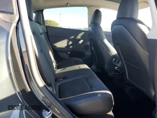 2024 Tesla Model Y with VIN 7SAYGDED4RF017614, listed as a Copart auction lot 88494625 with 11,209 mi miles and Salvage title. Bid and sale history available at DreamBid. Image 11.