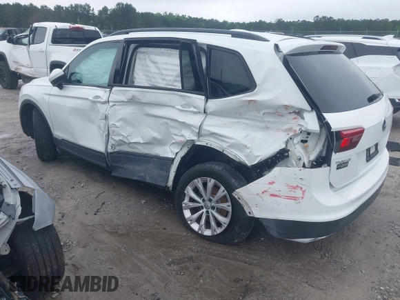 2018 Volkswagen Tiguan S with VIN 3VV1B7AX1JM032250, listed as a IAAI auction lot 42366790 with 65,406 mi miles and . Bid and sale history available at DreamBid. Image 3.