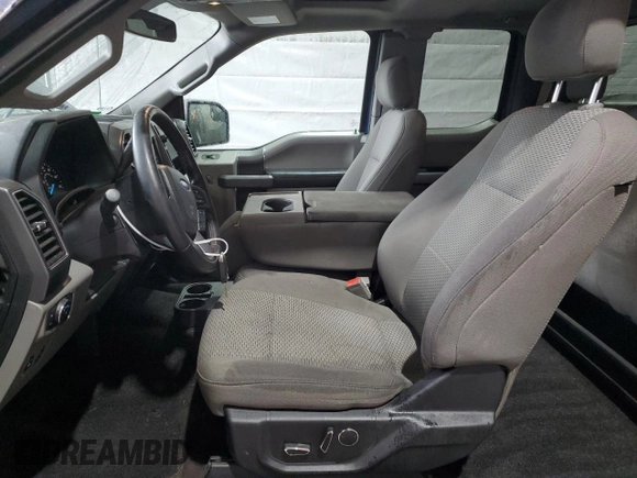 2018 Ford F-150 XL with VIN 1FTFX1E5XJKF85272, listed as a Copart auction lot 51056845 with 114,243 mi miles and Salvage Title. Bid and sale history available at DreamBid. Image 7.