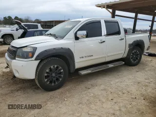 2012 Nissan Titan SV with VIN 1N6BA0ED7CN301371, listed as a Copart auction lot 47180115 with 168,855 mi miles and Salvage Title. Bid and sale history available at DreamBid. Image 1.