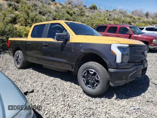 2023 Ford F-150 Lightning Pro with VIN 1FTVW1EL7PWG11261, listed as a Copart auction lot 47032775 with Not Provided miles and Salvage Title. Bid and sale history available at DreamBid. Image 4.