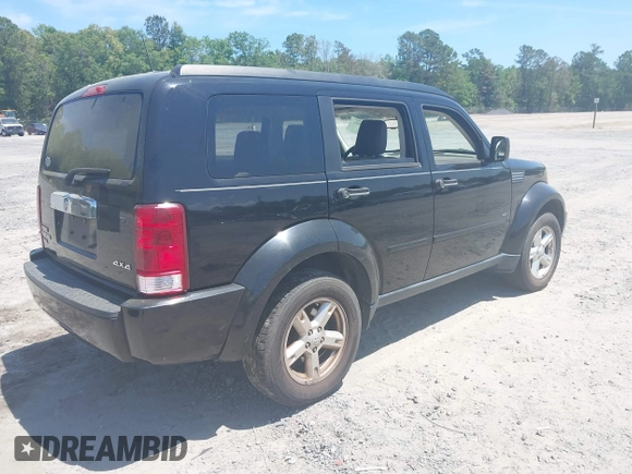 2007 Dodge Nitro SLT with VIN 1D8GU58K37W682094, listed as a IAAI auction lot 42155006 with 115,748 mi miles. Bid and sale history available at carsss.com. Image 4.