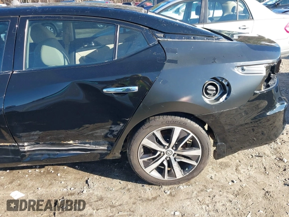 2019 Nissan Maxima Platinum z VIN 1N4AA6AV0KC379524, wystawiony jako IAAI lot #40862758 z przebiegiem 74 145 mil mil oraz . Historia ofert i sprzedaży dostępna na DreamBid. Obrazek 6.