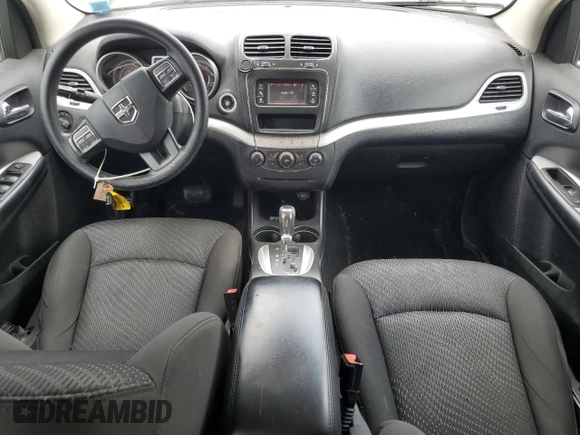 2017 Dodge Journey SXT with VIN 3C4PDDBG0HT542623, listed as a Copart auction lot 61628385 with 130,285 mi miles and Salvage title. Bid and sale history available at DreamBid. Image 8.
