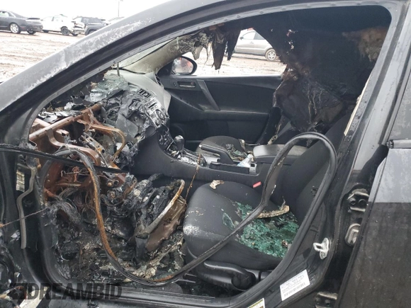 2012 Mazda 3 i Touring with VIN JM1BL1V73C1552053, listed as a Copart auction lot 85497304 with Not Provided miles and Salvage Title. Bid and sale history available at DreamBid. Image 7.