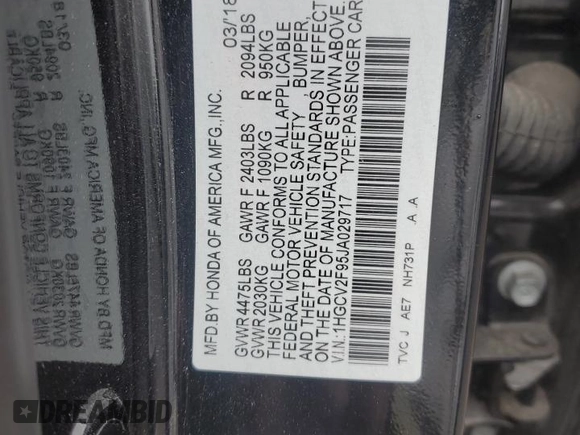 2018 Honda Accord Touring z VIN 1HGCV2F95JA029717, wystawiony jako Copart lot #56161585 z przebiegiem 128 576 mil mil oraz Szkoda całkowita • Salvage title. Historia ofert i sprzedaży dostępna na DreamBid. Obrazek 13.