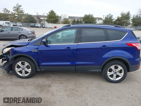2013 Ford Escape SE z VIN 1FMCU9GX5DUD35239, wystawiony jako IAAI lot #41677245 z przebiegiem Nie podano mil oraz . Historia ofert i sprzedaży dostępna na DreamBid. Obrazek 14.