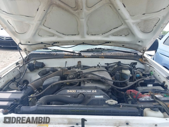 2001 Toyota Tacoma PreRunner z VIN 5TEGN92N11Z805360, wystawiony jako IAAI lot #42128006 z przebiegiem 295 381 mil mil oraz . Historia ofert i sprzedaży dostępna na DreamBid. Obrazek 10.