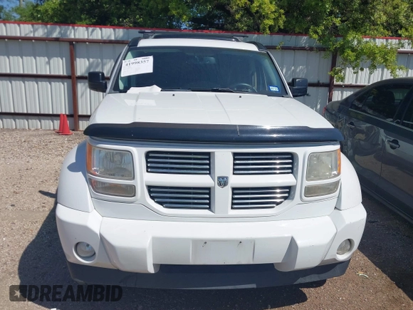 2011 Dodge Nitro Heat with VIN 1D4PT4GX9BW587284, listed as a IAAI auction lot 41998357 with 100,366 mi miles and . Bid and sale history available at DreamBid. Image 12.