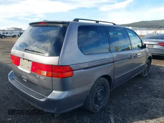 2000 Honda Odyssey EX with VIN 2HKRL1863YH621471, listed as a IAAI auction lot 41702650 with 167,050 mi miles and . Bid and sale history available at DreamBid. Image 4.