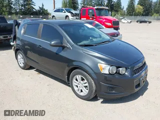 2014 Chevrolet Sonic LT with VIN 1G1JC6SB9E4112740, listed as a IAAI auction lot 42127723 with 137,222 mi miles. Bid and sale history available at carsss.com. Image 1.