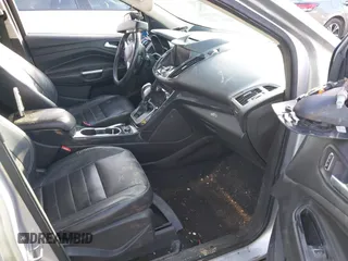 2014 Ford Escape Titanium with VIN 1FMCU0JX3EUB22005, listed as a IAAI auction lot 41610799 with 248,066 mi miles. Bid and sale history available at carsss.com. Image 5.